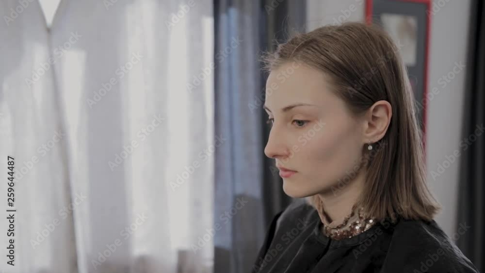 Beautiful young girl awaits the start of makeup. Beautiful young girl awaits the start of makeup.