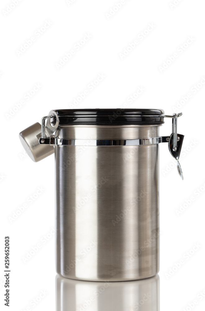 Stainless steel coffee ground container and scooper isolated on white background Stainless steel coffee ground container and scooper isolated on white background