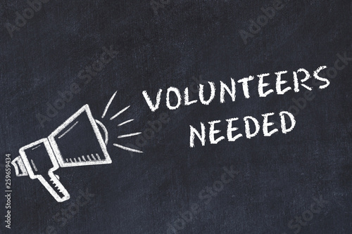 Chalk board sketch with loudspeaker and phrase volunteers needed