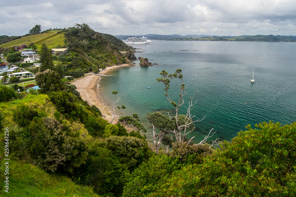 Coastline view from Tapeka Point Track with blue sky above in Russell, Northland, New Zealand Coastline view from Tapeka Point Track with blue sky above in Russell, Northland, New Zealand