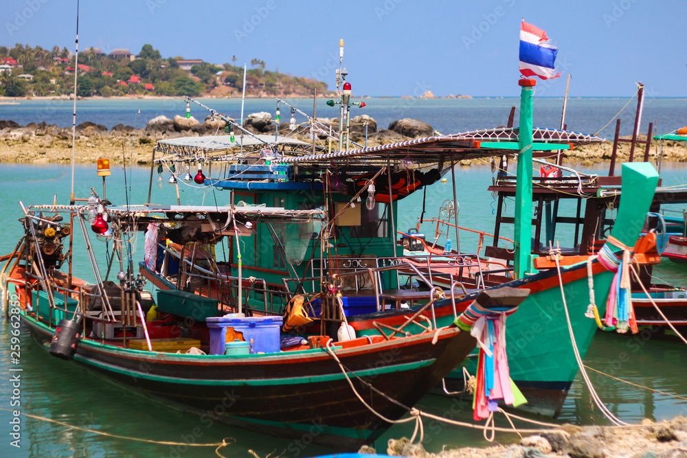 Beautiful Thai fishing boats on the pier