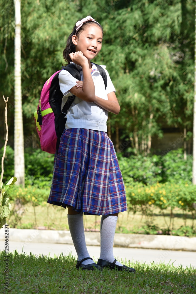 Happy Young Filipina Person With Notebooks Happy Young Filipina Person With Notebooks
