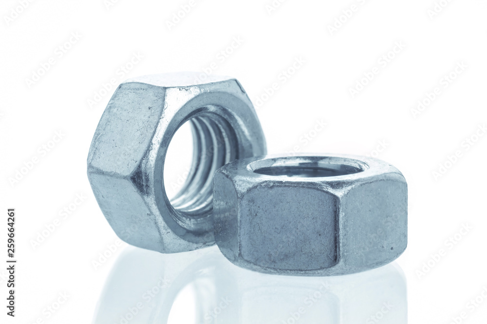 Closeup Bolts, steel screwbolts and nuts Used for capturing workpieces mechanical parts And construction isolated on a white background industrial concept Closeup Bolts, steel screwbolts and nuts Used for capturing workpieces mechanical parts And construction isolated on a white background industrial concept
