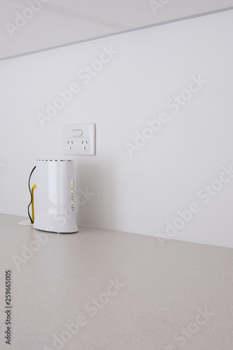 Modem against a white wall
