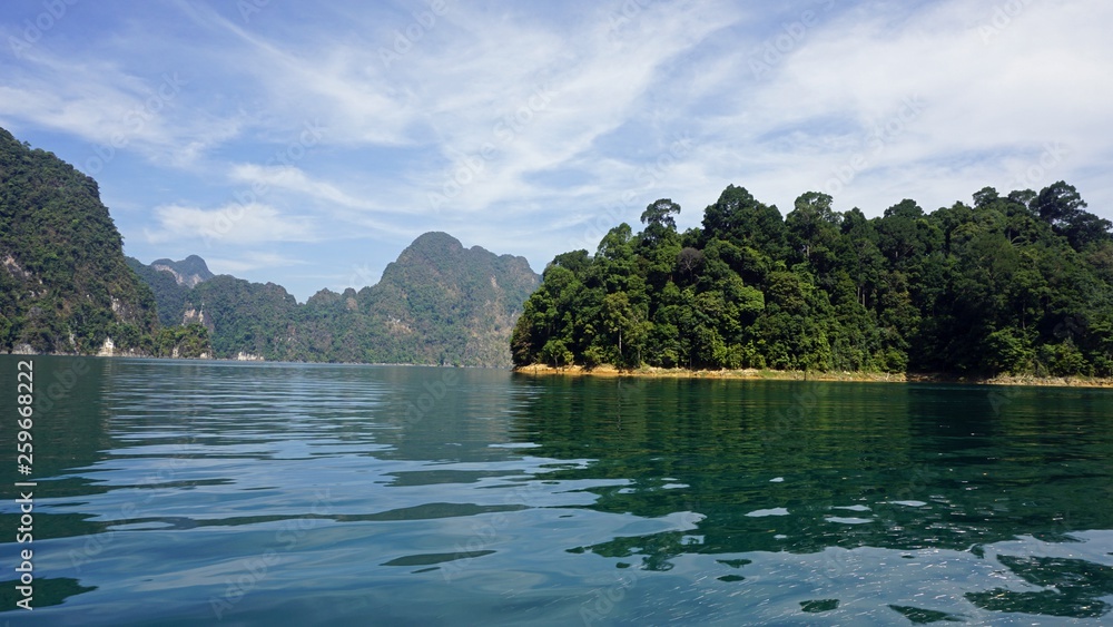 tropical landscape on chiao lan lake in khao sok