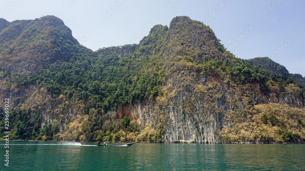 tropical landscape on chiao lan lake in khao sok