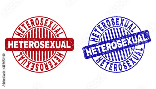 Grunge HETEROSEXUAL round stamp seals isolated on a white background. Round seals with grunge texture in red and blue colors.