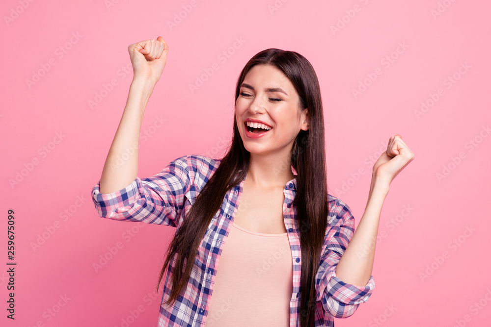Close up photo amazing beautiful her she lady hold both arms hands raised up party festive mood celebrating holiday amused wear casual checkered plaid shirt clothes outfit isolated pink background Close up photo amazing beautiful her she lady hold both arms hands raised up party festive mood celebrating holiday amused wear casual checkered plaid shirt clothes outfit isolated pink background