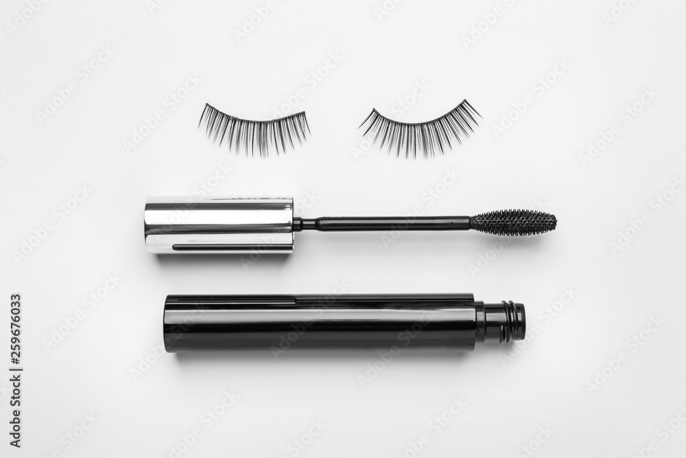 Mascara with false eyelashes on white background Mascara with false eyelashes on white background