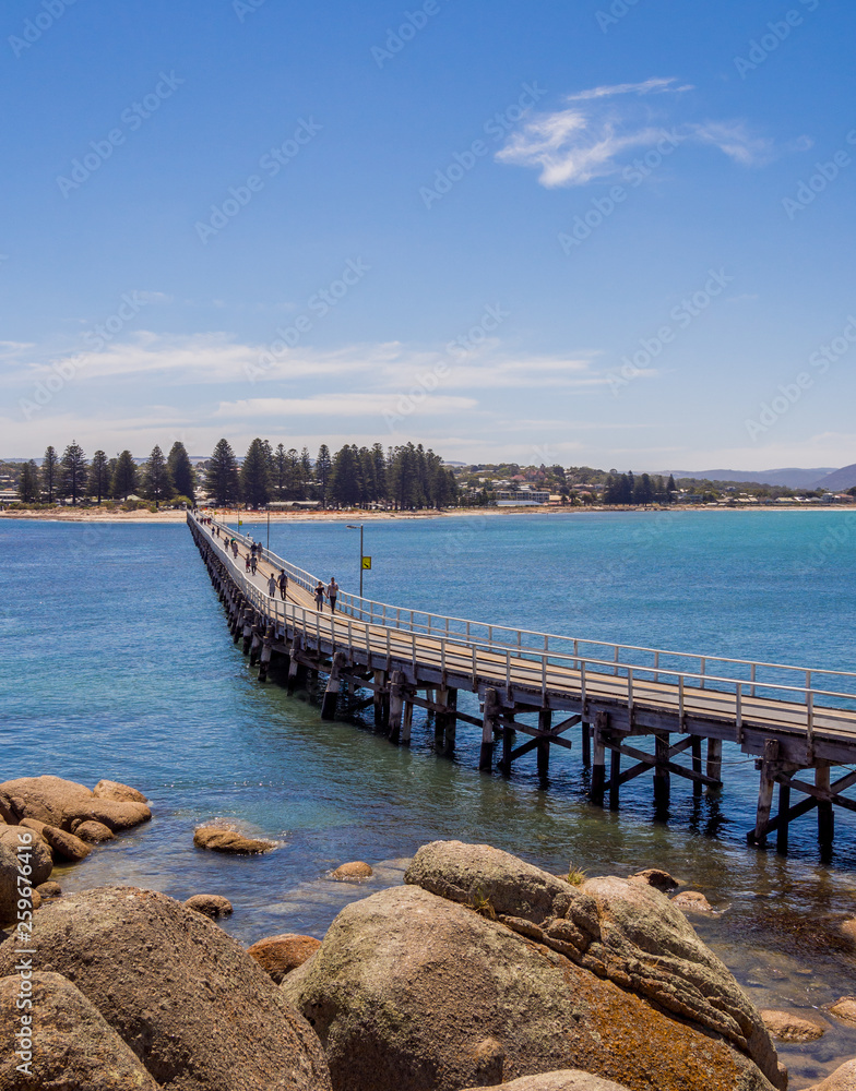 Old wooden bridge connecting Victor Harbour to Granite Island, South Australia.