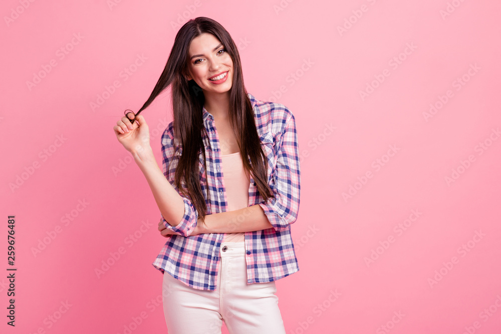 Portrait of her she nice-looking attractive cute charming lovely shine content cheerful cheery straight-haired lady playing with curl isolated over pink pastel background Portrait of her she nice-looking attractive cute charming lovely shine content cheerful cheery straight-haired lady playing with curl isolated over pink pastel background