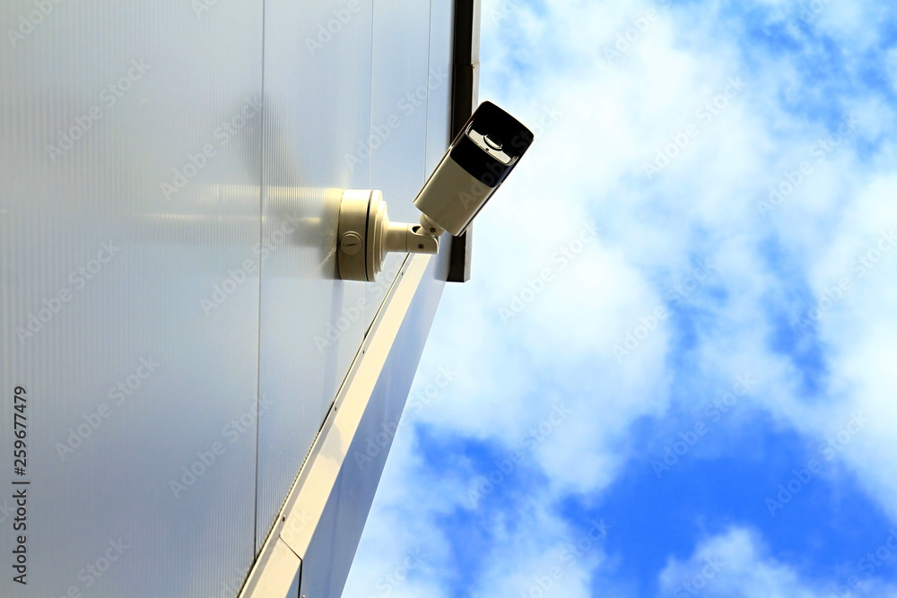 security camera overlooking an industrial area no people stock photo security camera overlooking an industrial area no people stock photo