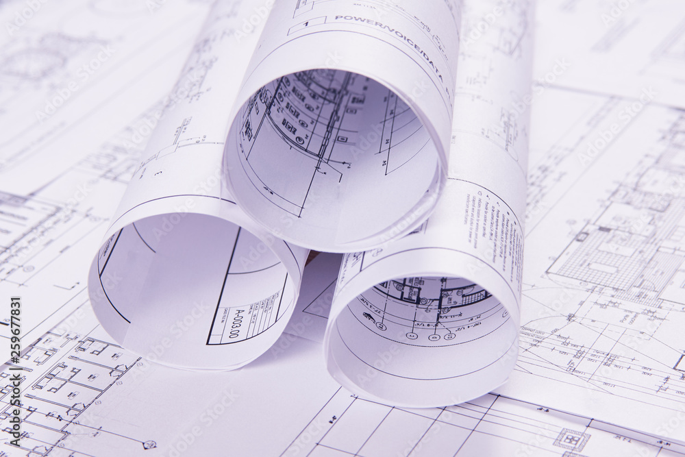Engineering background. Construction drawings of buildings and structures for the project engineering work. Close-up. Engineering background. Construction drawings of buildings and structures for the project engineering work. Close-up.
