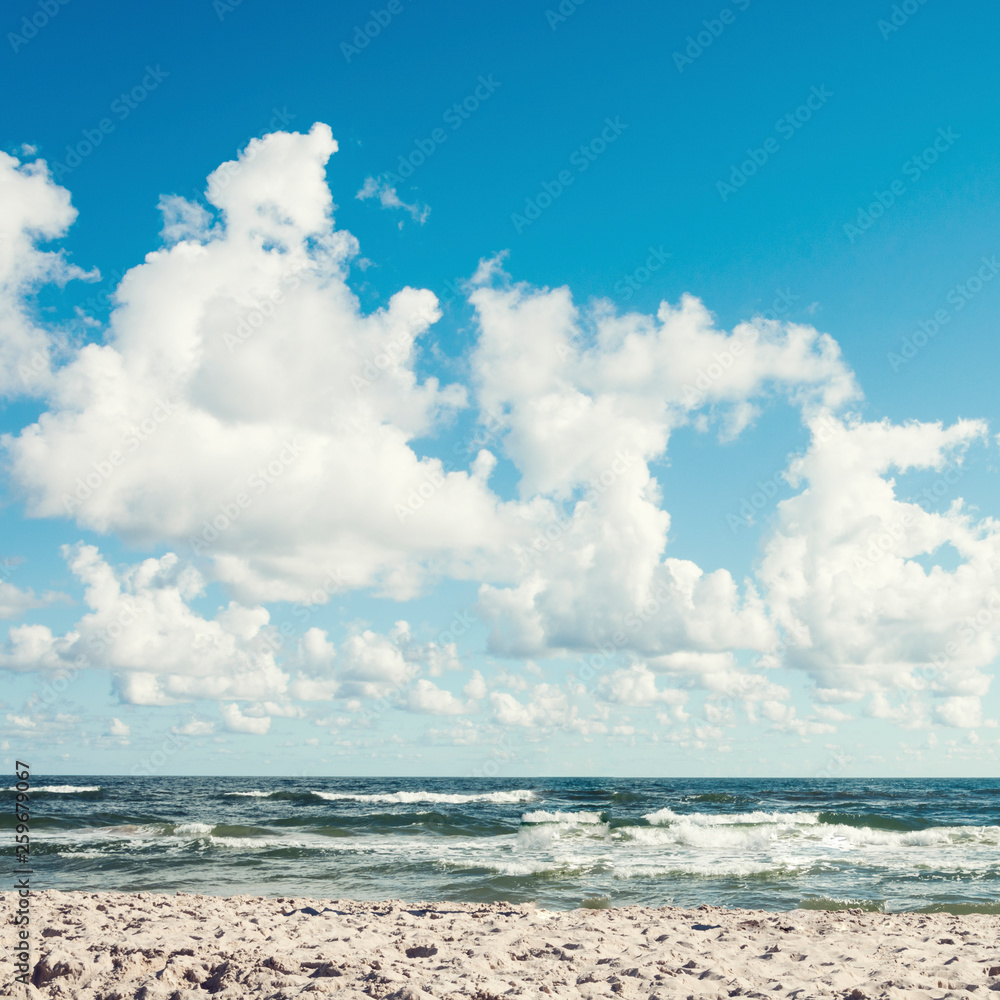 calming view of sea side clouds on blue sky and sand square