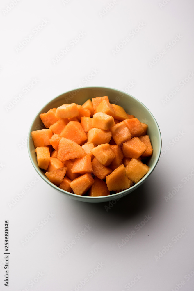 Cantaloupe / muskmelon / kharbuja cut into pieces, served in a bowl. selective focus Cantaloupe / muskmelon / kharbuja cut into pieces, served in a bowl. selective focus