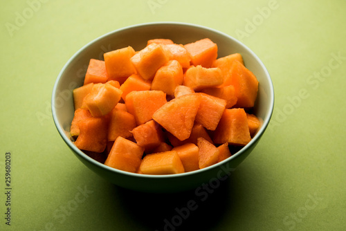 Cantaloupe / muskmelon / kharbuja cut into pieces, served in a bowl. selective focus photo