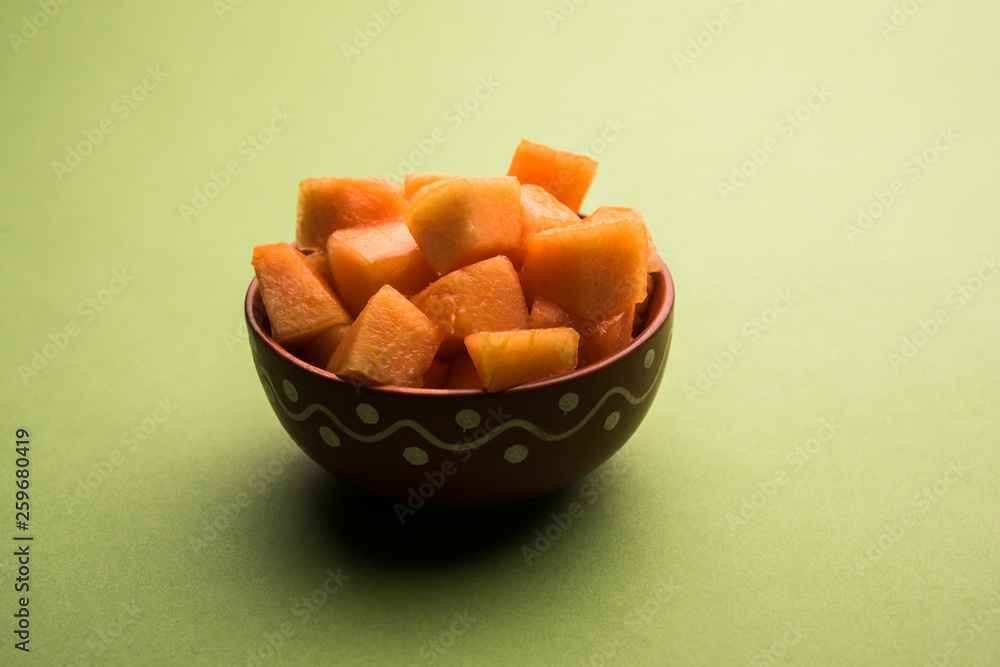 Cantaloupe / muskmelon / kharbuja cut into pieces, served in a bowl. selective focus Cantaloupe / muskmelon / kharbuja cut into pieces, served in a bowl. selective focus