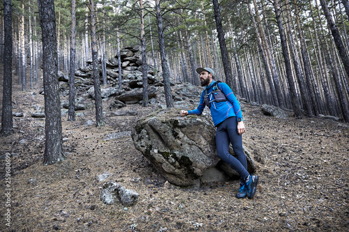 Trail running in the forest photo