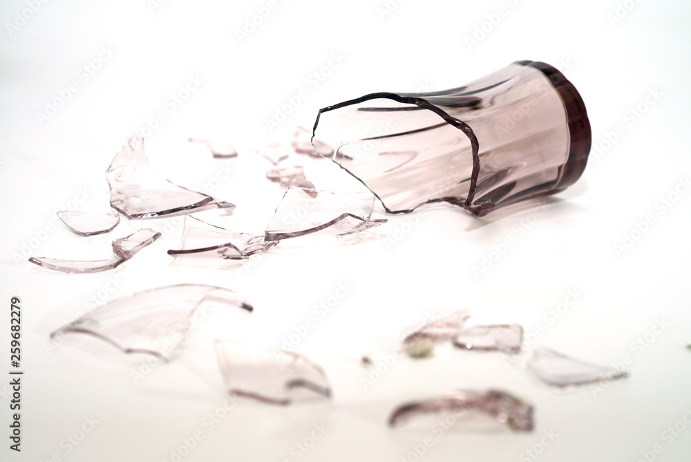 Naklejka premium Broken glass on white background.