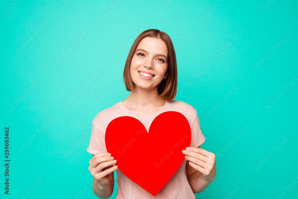 Close up photo beautiful funny funky her she lady short hairdo hands arms hold pretty sweet large heart shape figure postcard wear casual pastel t-shirt clothes isolated teal turquoise background Close up photo beautiful funny funky her she lady short hairdo hands arms hold pretty sweet large heart shape figure postcard wear casual pastel t-shirt clothes isolated teal turquoise background