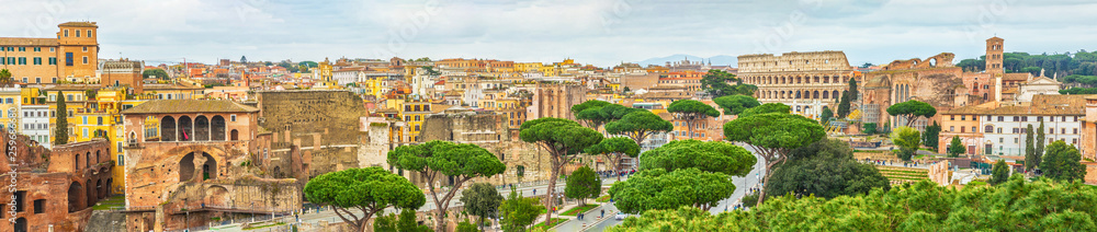 Scenic shot of Rome with Colosseum and Roman Forum, Italy.