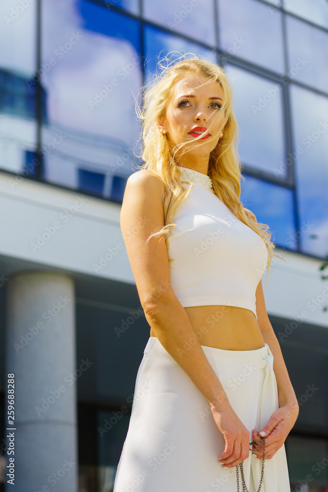 Blonde woman in city Blonde woman in city