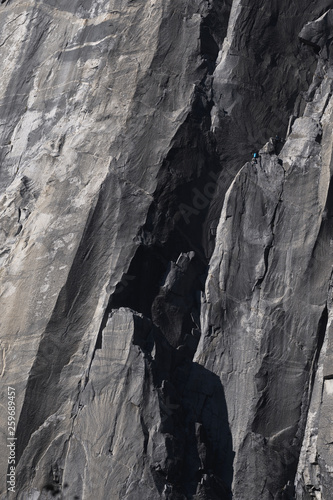 Climbers attempt to climb jagged granite of El Capitan in Yosemite National Park