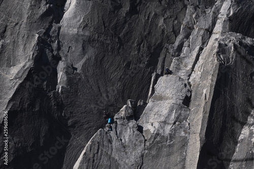Climbers attempt to climb jagged granite of El Capitan in Yosemite National Park