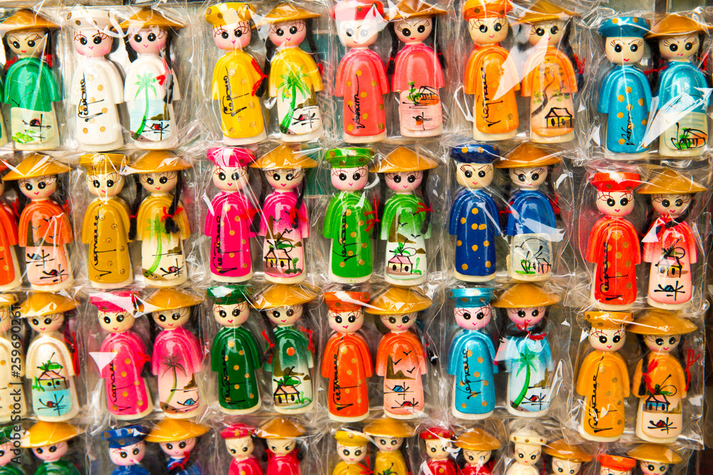 Colorful figurines in the shop. Vietnam souvenirs.