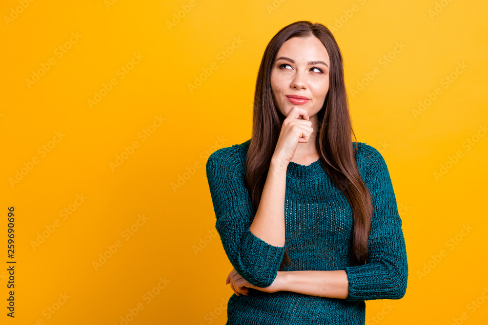 Close up photo amazing funky her she lady long straight hairdo clever brown eyes look up empty space hand arm finger chin thought wear green knitted pullover jumper clothes isolated yellow background - obrazy, fototapety, plakaty 