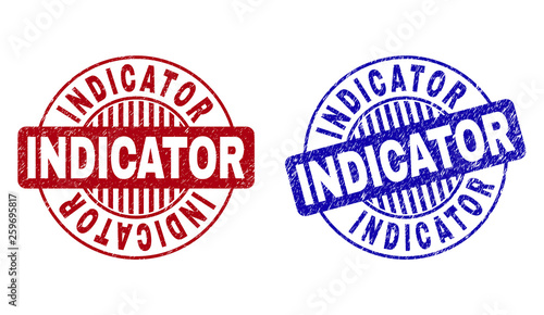 Grunge INDICATOR round stamp seals isolated on a white background. Round seals with grunge texture in red and blue colors. Vector rubber imprint of INDICATOR text inside circle form with stripes.