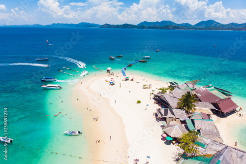 AERIAL. Top view of tropical island with white sandy beach , Khai island, Phuket, Thailand.
