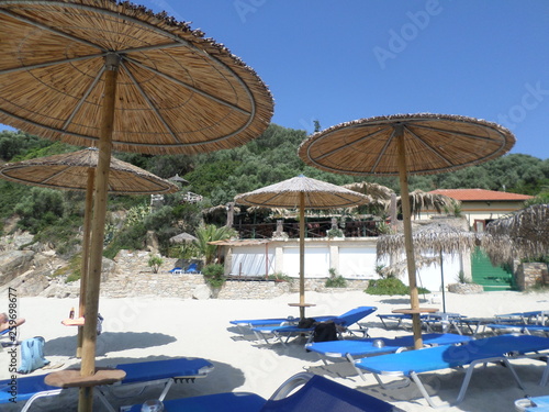 beach chairs and umbrella