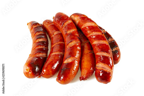 Grilled sausages isolated on a white background photo