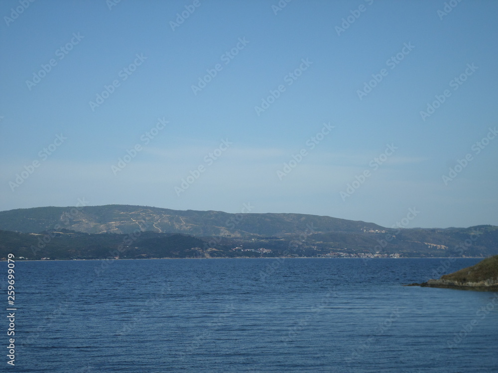 view of the sea and mountains view of the sea and mountains