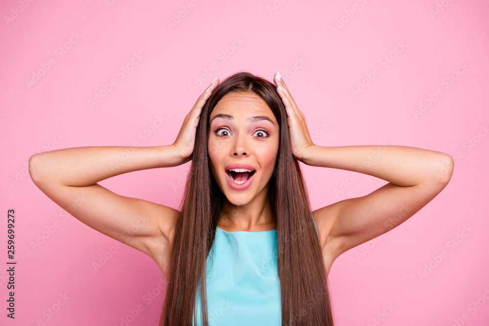 Close up photo of pretty attractive lady showing emotions model touching head hearing about discounts news astonished wearing bright outfit isolated on rose-colored background