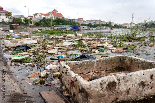 Polluted river fill with trash