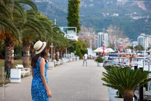 Europe summer travel mediterranean destination. Tourist woman on vacation walking on the marina © Nickolay Khoroshkov