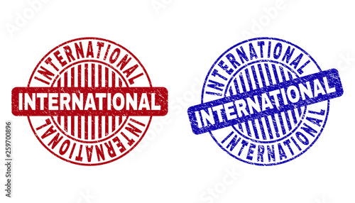 Grunge INTERNATIONAL round stamp seals isolated on a white background. Round seals with grunge texture in red and blue colors.