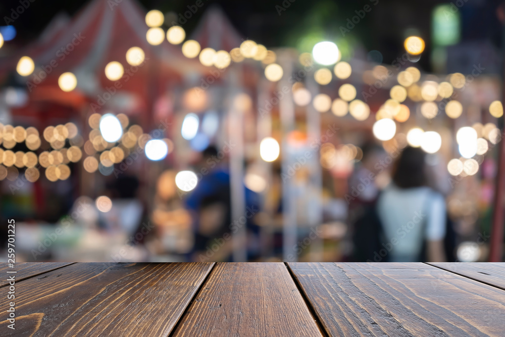 Empty wooden table of brown on front blurred colorful background, for presentation and advertising product and template, website banner Empty wooden table of brown on front blurred colorful background, for presentation and advertising product and template, website banner