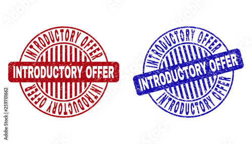 Grunge INTRODUCTORY OFFER round stamp seals isolated on a white background. Round seals with grunge texture in red and blue colors.