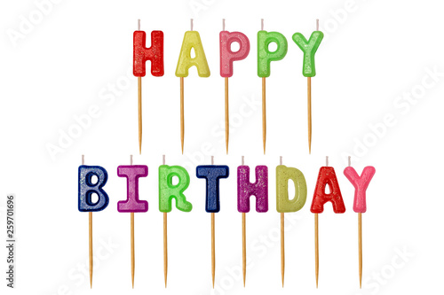 Canvas Print Multicolored inscription Happy birthday candles letters on wooden stick isolate