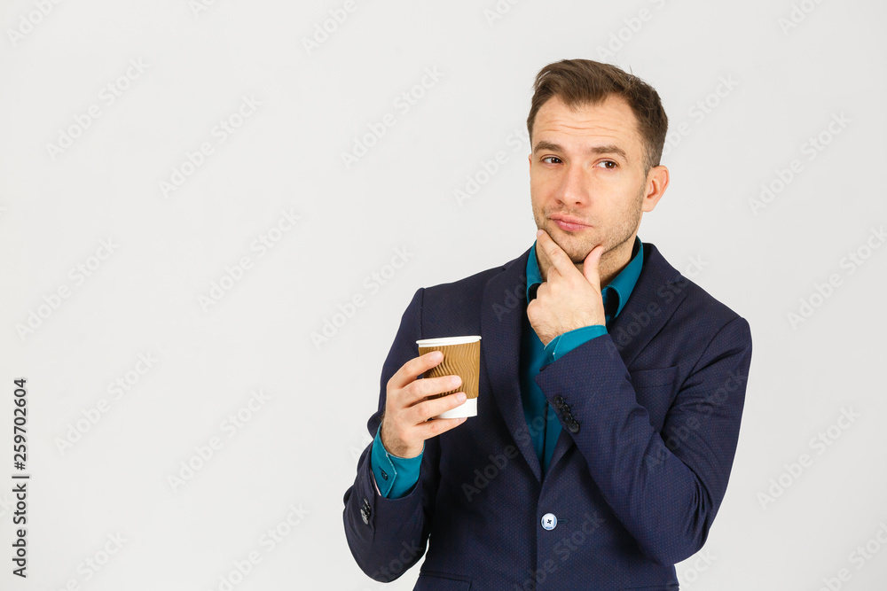 businessman hand holding a coffee cup on white background