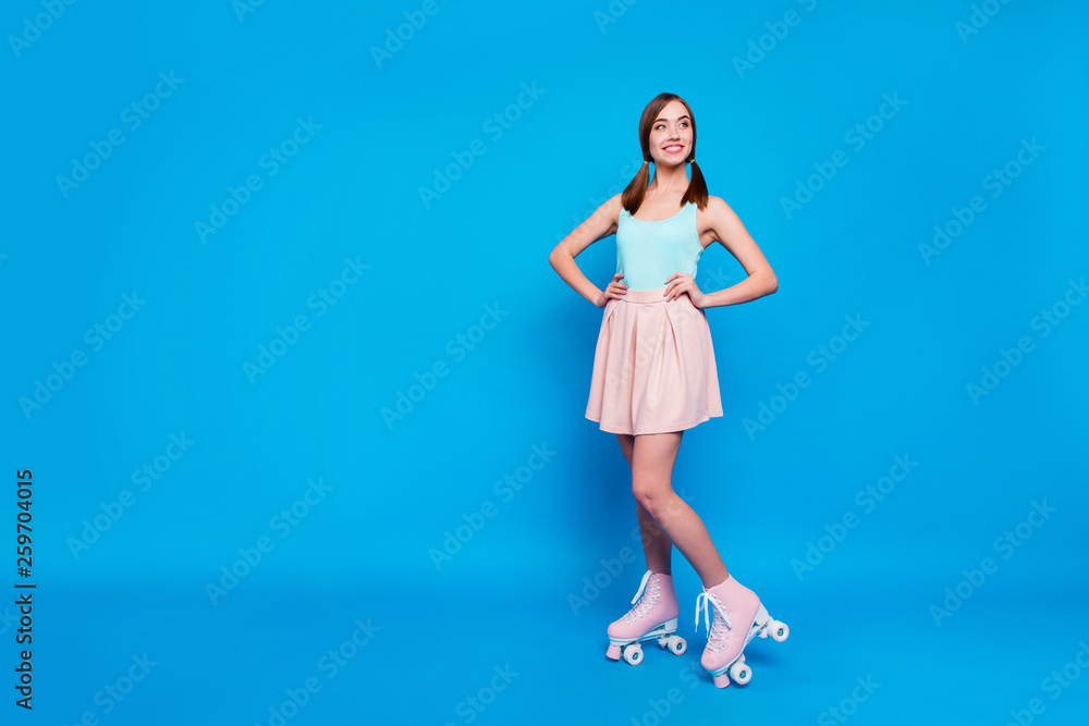 Full length body size photo funny beautiful she her lady look empty space coquettish rollers legs active way life fit body wear casual street summer pastel dress clothes isolated blue background Full length body size photo funny beautiful she her lady look empty space coquettish rollers legs active way life fit body wear casual street summer pastel dress clothes isolated blue background