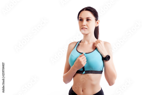 Fitness woman ready for sports exercises wearing a smartwatch activity tracker. Fit girl living an active lifestyle