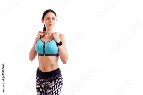 Fitness woman  ready for sports exercises wearing a smartwatch activity tracker. Fit girl living an active lifestyle © Виталий Сова