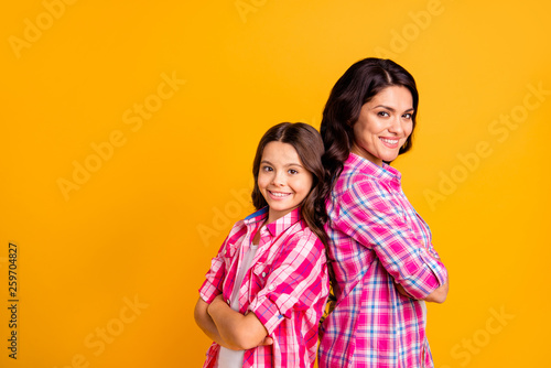 Portrait of hispanic person motherhood concept standing back-to-back feel independent teamwork stylish enjoy hairstyle dressed in vibrant clothing isolated on colorful background
