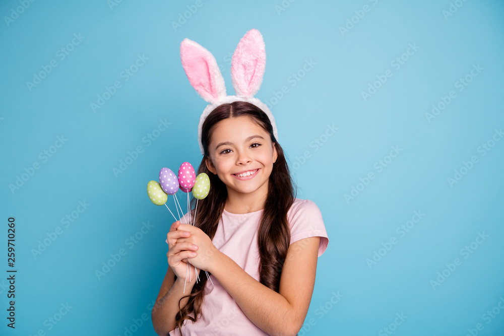 Closeup photo portrait of lovely with beaming teeth smile white caucasian girl in pink tender gentle t-shirt holding collection on handmade craft diy easter eggs in hands isolated vibrant background Closeup photo portrait of lovely with beaming teeth smile white caucasian girl in pink tender gentle t-shirt holding collection on handmade craft diy easter eggs in hands isolated vibrant background