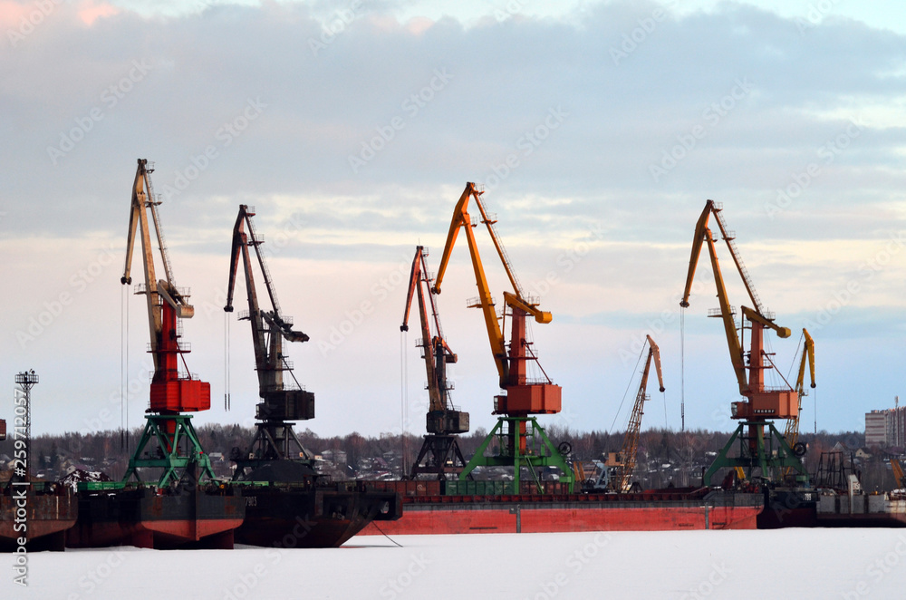  cargo port on the background of a winter river