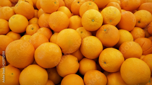 Orange fruits in supermarket.